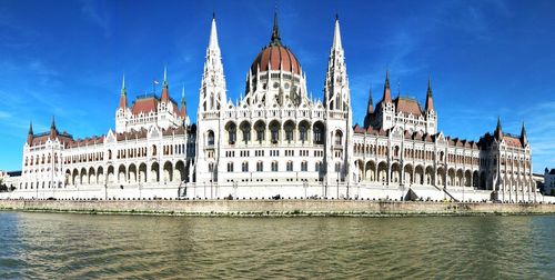 View of buildings at waterfront- budapest parliament