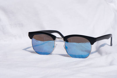 Close-up of sunglasses on table