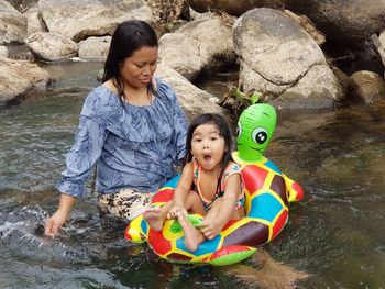 Happy girl smiling woman in water