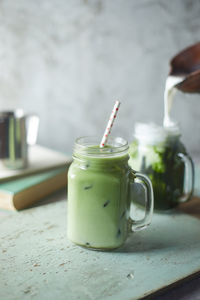 Close-up of drink in jar on table