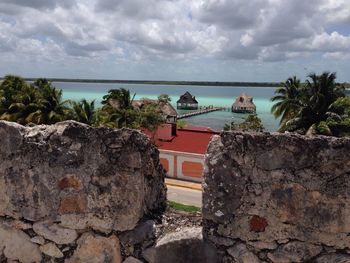 Scenic view of sea against cloudy sky