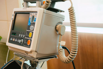 Close-up of telephone on table