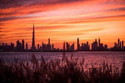 View of buildings against sky during sunset