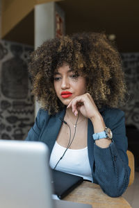 Young woman using mobile phone