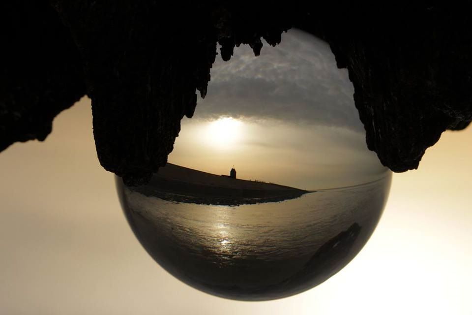 SCENIC VIEW OF HANGING FROM ROCK