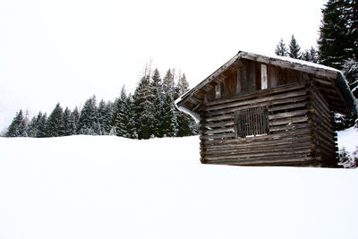 House against clear sky during winter