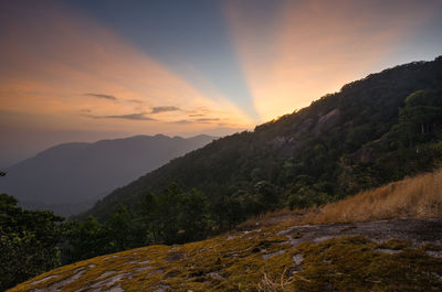 Scenic view of mountains against sky during sunset