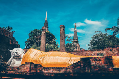 Low angle view of temple against building