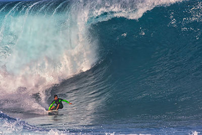 Man surfing in sea