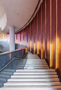 Interior of hotel with marble staircase and banisters