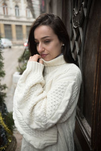 Portrait of woman standing in snow