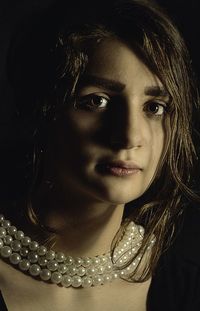 Close-up portrait of young woman