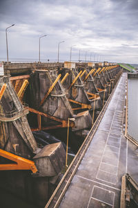 High angle view of old pier against sky