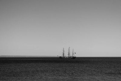 Distance shot of boat in calm sea