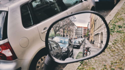 Reflection of bicycle on side-view mirror