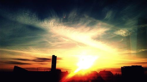 Silhouette of buildings at sunset