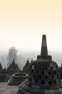 Stupas of building against sky