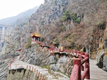 Panoramic view of rocks and plants against mountains