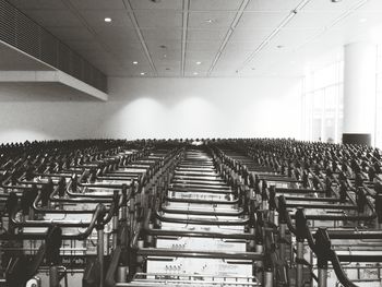 Row of people on tiled floor