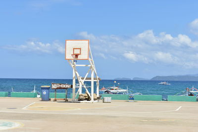 Basketball court by sea