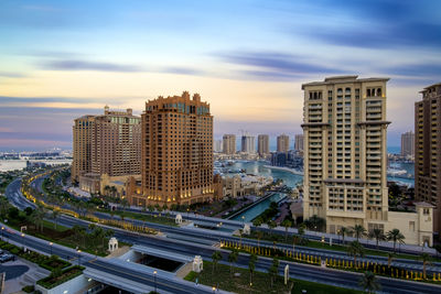 Buildings in city against sky
