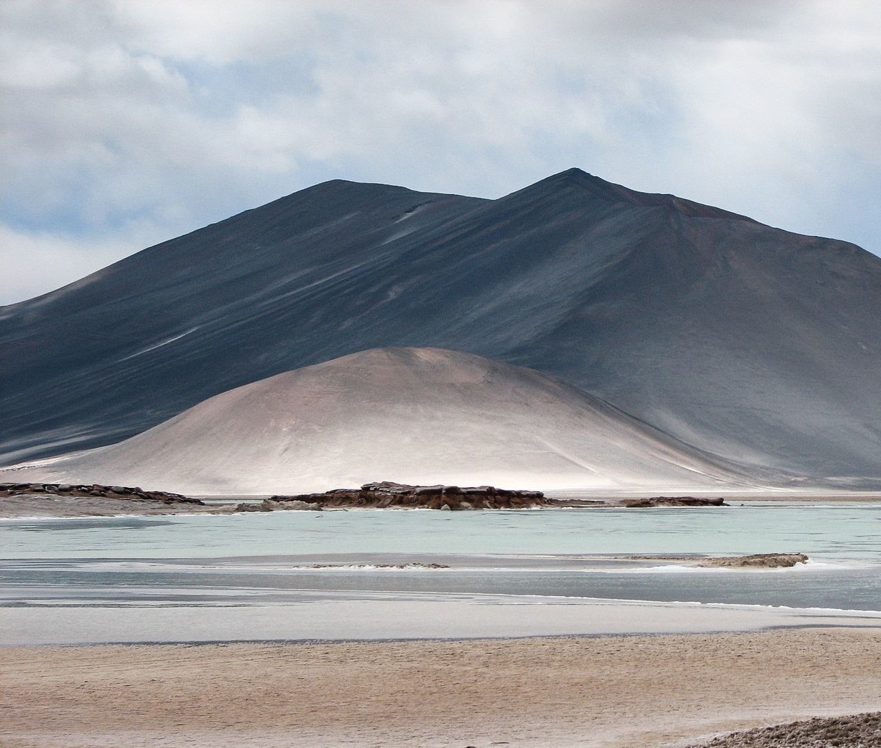 sky, mountain, scenics - nature, beauty in nature, land, cloud - sky, water, sea, tranquil scene, tranquility, day, nature, non-urban scene, no people, volcano, beach, idyllic, landscape, environment, outdoors, mountain peak, volcanic crater, arid climate