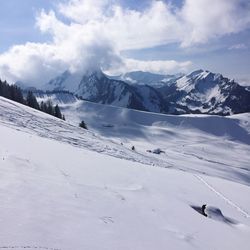 Scenic view of snowcapped mountains