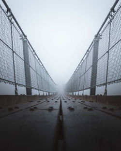 View of suspension bridge against clear sky