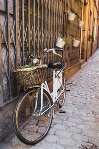 Bicycle parked against wall