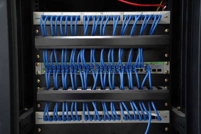 Selective focus of cat6 patch cord cables going from patch panel to allied telesis network switches