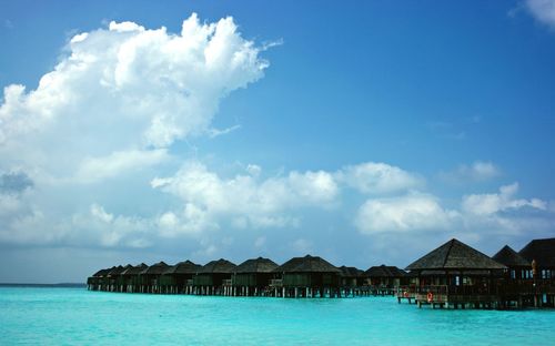 Scenic view of sea against cloudy sky