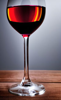 Close-up of wineglass on table