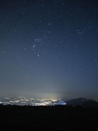 Scenic view of illuminated star field against sky at night