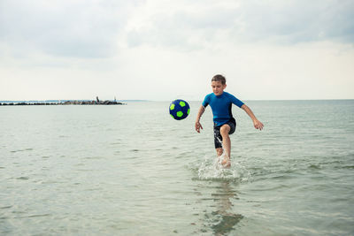 Full length of child on beach