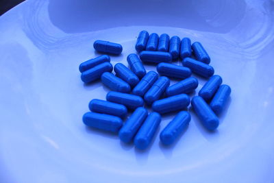 Close-up of blue capsules