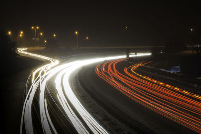 Light trails on road at night