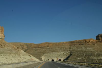 Road on landscape against clear sky