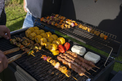 High angle view of meat on barbecue grill