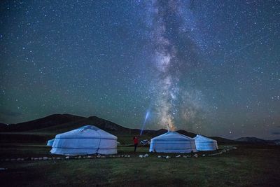 Tent against sky at night