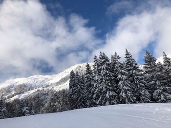 Snow covered mountain against sky