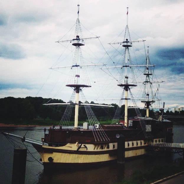 sky, transportation, cloud - sky, nautical vessel, mode of transport, water, cloudy, moored, boat, cloud, harbor, built structure, no people, river, building exterior, outdoors, nature, day, mast, lake