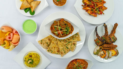 High angle view of food served on table