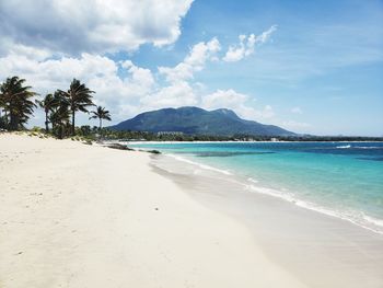 Scenic view of beach against sky