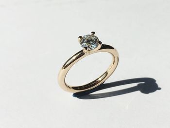 Close-up of a ring on white background