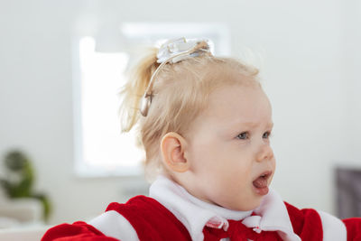 Close-up of girl looking away