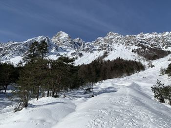 Snow covered mountain against sky