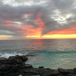 Scenic view of sea against sky during sunset