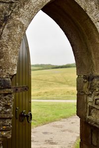 Close-up of open door on field