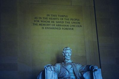 Statue against wall