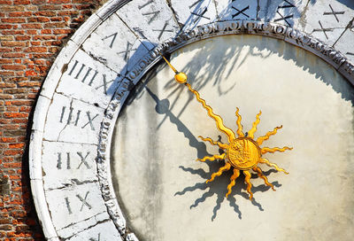 Clock of san giacomo di rialto against clear blue sky